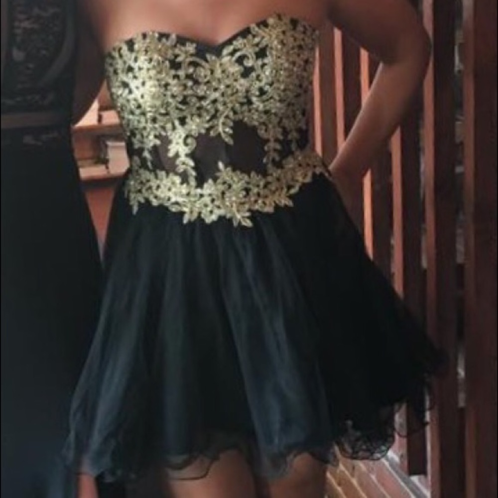 Strapless black and gold dress